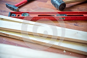 Different construction tools with Hand tools for home renovation on wooden board maintenance