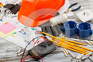 Different construction tools, wooden background