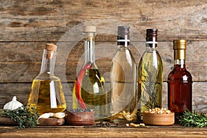 Different cooking oils in bottles on table