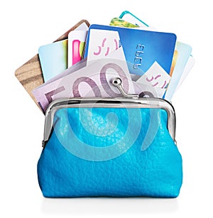 Different credit cards and euro banknotes in purse
