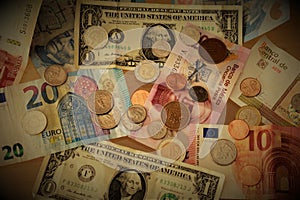 Different currencies coins and notes