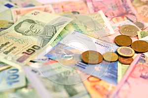 Different currency note and coins from different countries background