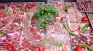 Different Cuts of Fresh Raw Red Meat in a Supermarket