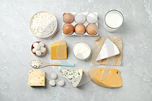 Different dairy products on marble table