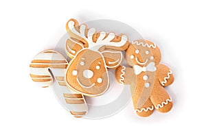 Different delicious Christmas cookies on white background, top view