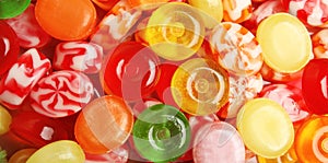 Different delicious colorful candies as background. Banner design