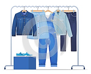 Different denim clothes and shoes hanging on rack vector flat illustration. Fashion wardrobe apparel