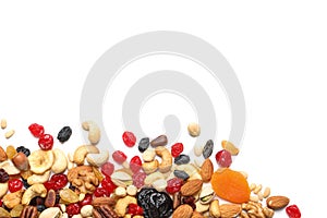 Different dried fruits and nuts on white background, top view.