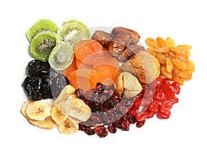 Different dried fruits on white background, top view