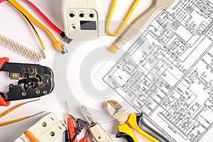 Different electrical tools on electrical engineering drawings . photo