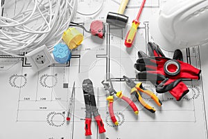 Different electrician\'s supplies on electrical scheme