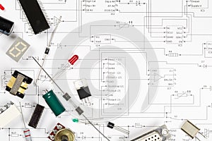 Different electronic parts or components on pcb wiring scheme with resistors, capacitors, diode and ic chips, flat lay top view