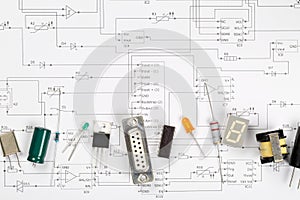 Different electronic parts or components on pcb wiring scheme with resistors, capacitors, diode and ic chips, flat lay top view
