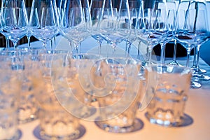 Different empty glasses on served table at the restaurant