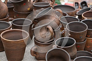 Different examples of traditional ukrainian clay pottery: pots, jars, vases, cups and bowls