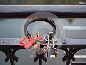 Different form of locks, locked on the fence above the chanel in Colmar