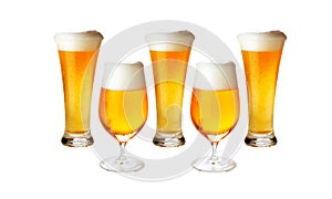 Different glasses of cold lager beer isolated