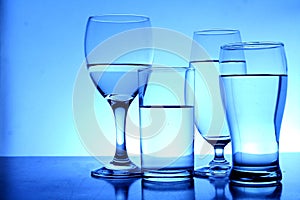 Different glasses of water photo