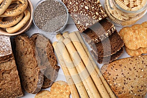 Different gluten free products on white background, flat lay