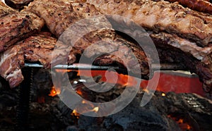 Different grilled meat outdoors, in Spain photo