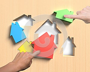 Different houses suit house shape holes board with hands assembl