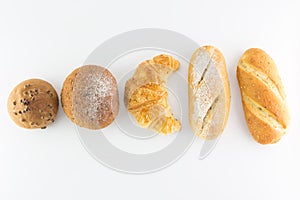 Different kinds of bread isolated on white