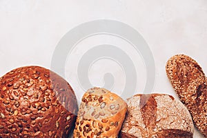 Different kinds of bread on white backdround