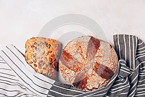 Different kinds of bread on white backdround.