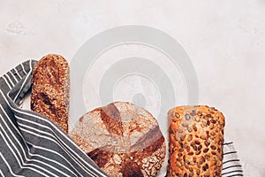 Different kinds of bread on white backdround.