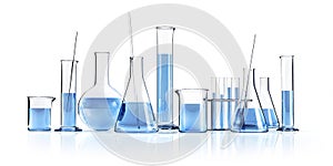 Different Laboratory glassware with blue liquids