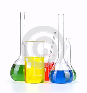 Different laboratory glassware with colored liquid isolated over white