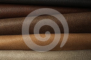 Different leather samples as background, closeup