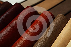 Different leather samples as background, closeup