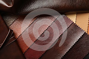 Different leather samples as background, closeup