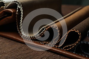 Different leather samples on table, closeup