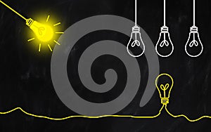 Different light bulbs with copy space, ideas concept. Illustration on blackboard background photo