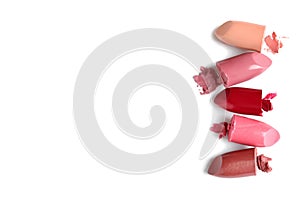 Different lipstick swatches on white background