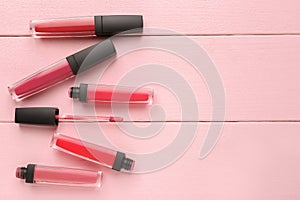 Different liquid lipsticks on table