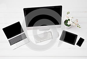 Different modern gadgets on desk