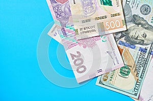 Different money on blue background. Payment of pensions, salaries