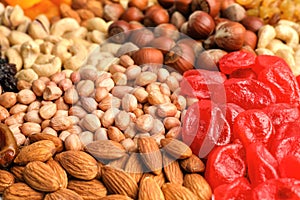 Different nuts and dried berries, closeup