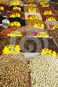 Different nuts and dried fruits on open asian market