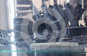 Different objects from powder plastic printed on 3D printer Multi Jet Fusion MJF