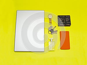 Different objects on yellow background.