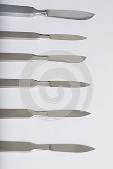 Different One-Piece Scalpels on white background