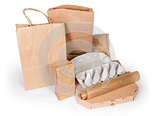 Different paper and carton food packaging on a white background