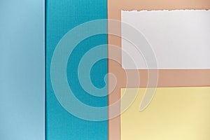 different paper textures with torn and smooth edges on a beige background. . place for text.