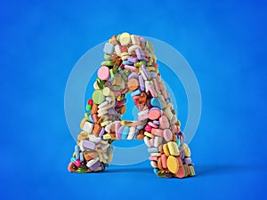 different pills stack in shape of letter A.