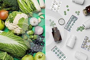 Different prebiotic supplements and foodstuff on color background, flat lay