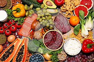 Different products on grey table  top view. Healthy food and balanced diet